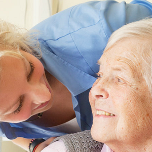 older woman and younger girl talking