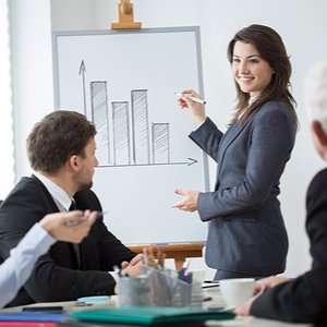 girl pointing to a chart