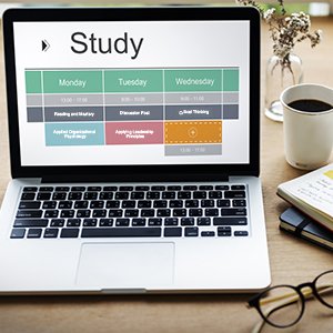 computer and coffee cup