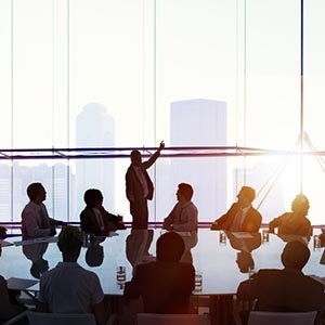 Manager Leading a Meeting