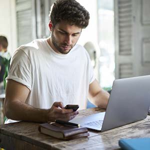 college student with a laptop