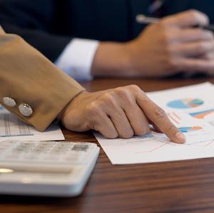 someone pointing at chart