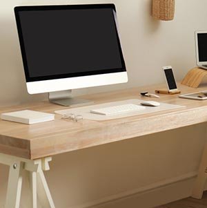 study space with computer and phone