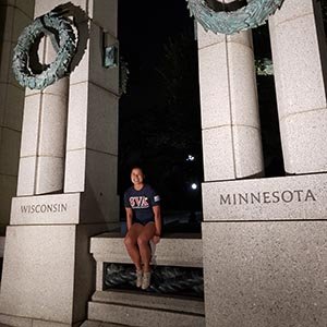 girl smiling on steps