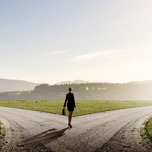 business woman at a cross-roads